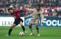 Ronaldinho and Andrea Pirlo in action during the match